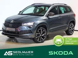 Quarzgrau Gebraucht 2022 Skoda Karoq SportLine SUV | 27.900 € (Etwas zu teuer)