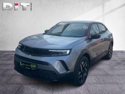 Grau met. Gebraucht 2023 Opel Mokka-e GS Line SUV | 14.990 €