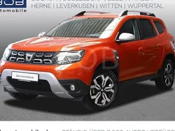 Arizonaorange metal (orange) Gebraucht 2022 Dacia Duster Prestige SUV | 22.870 € (Fairer Preis)