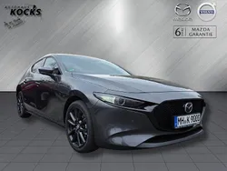 Machine gray Gebraucht 2024 Mazda 3 Exclusive-Line Limousine | 28.990 € (Fairer Preis)