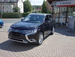 Pantherschwarz Gebraucht 2021 Mitsubishi Outlander P-HEV Top SUV | 22.690 € (Fairer Preis)