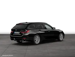 Schwarz Gebraucht 2024 BMW 330e Comfort Edition Kombi | 46.494 € (Fairer Preis)