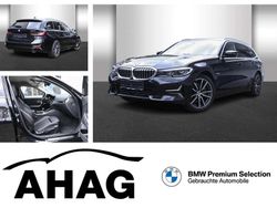 Schwarz uni Gebraucht 2022 BMW 320e Luxury Line Kombi | 26.840 € (Fairer Preis)