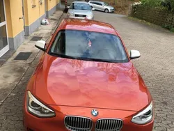 Orange Gebraucht 2012 BMW 120 Lifestyle Kleinwagen | 10.000 €