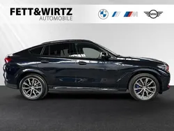 Carbonschwarz metallic Gebraucht 2022 BMW X6 M Sport SUV | 59.790 € (Superpreis)