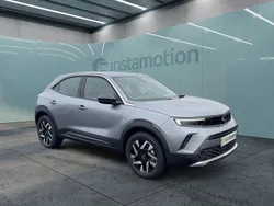 Grau Gebraucht 2023 Opel Mokka-e Elegance SUV | 22.650 € (Fairer Preis)