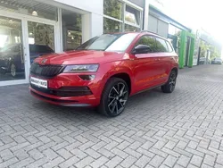 Velvetrot metallic met. Gebraucht 2021 Skoda Karoq SportLine SUV | 26.990 € (Etwas zu teuer)