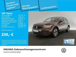 Ginger brown metallic Gebraucht 2024 VW Tiguan Move SUV | 32.514 € (Superpreis)
