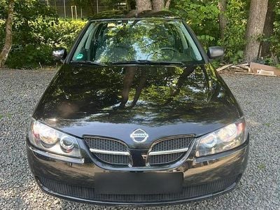 Second-hand Nissan Almera 98 CP (72 kW) 2005 Negru Hatchback