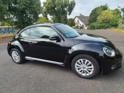 Gebraucht VW Beetle Comfortline 105 PS (77 kW) 2012 Schwarz Kleinwagen