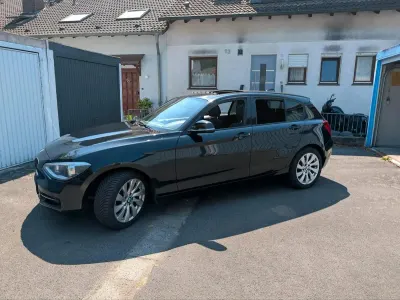 Gebraucht BMW 116 Sport Line 136 PS (100 kW) 2012 Schwarz Kleinwagen