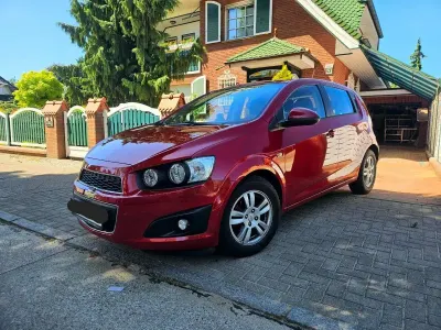 Gebraucht Chevrolet Aveo LT 101 PS (74 kW) 2011 Rot Limousine