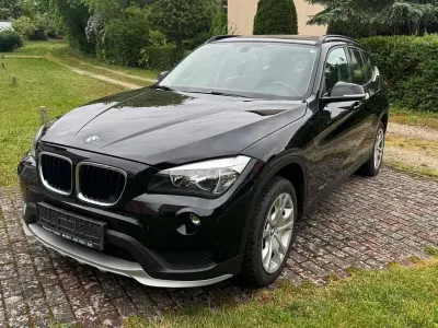 Używany BMW X1 116 KM (85 kW) 2014 Czarny SUV