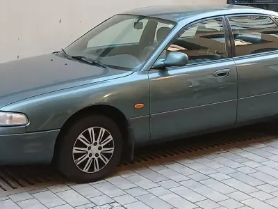 Gebraucht Mazda 626 90 PS (66 kW) 1997 Grün Limousine