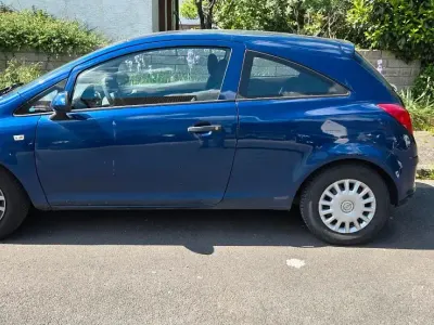Używany Opel Corsa 60 KM (44 kW) 2009 Niebieski Hatchback