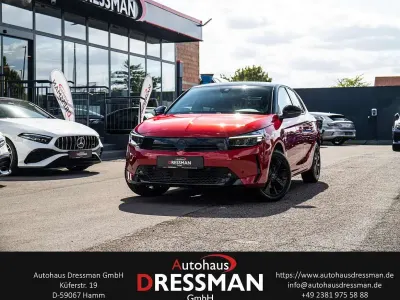 Gebraucht Opel Corsa 101 PS (74 kW) 2024 Lackierung peperoncino red/typ Kleinwagen
