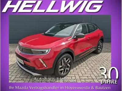 Gebraucht Opel Mokka Elegance 131 PS (96 kW) 2023 Kosmos rot metallic (metallic) SUV