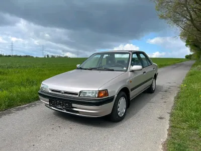 Gebraucht Mazda 323 88 PS (64 kW) 1992 Gold Limousine