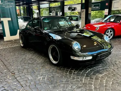 Gebraucht Porsche 911 Carrera 272 PS (200 kW) 1995 Schwarzmetallic Coupé