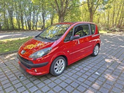 Second-hand Peugeot 1007 108 CP (79 kW) 2006 Roșu Monovolum