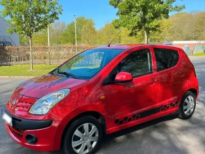 Gebraucht Nissan Pixo 69 PS (50 kW) 2009 Rot Kleinwagen