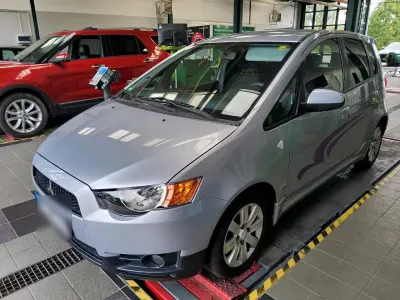 Gebraucht Mitsubishi Colt 95 PS (69 kW) 2012 Silber Kleinwagen