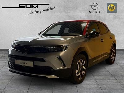Gebraucht Opel Mokka-e Elegance 100 kW (136 PS) 2022 Kontrast grau/quarz silber SUV