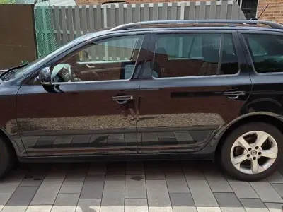 Gebraucht Skoda Octavia Ambition 122 PS (89 kW) 2013 Schwarz Kombi