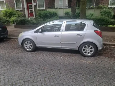 Gebraucht Opel Corsa 70 PS (51 kW) 2007 Silber Kleinwagen