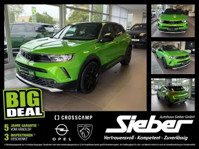 Gebraucht Opel Mokka Ultimate 131 PS (96 kW) 2023 Lackierung matcha green/typ au SUV