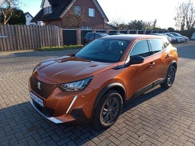 Gebraucht Peugeot e-2008 Active 100 kW (136 PS) 2022 Met.orange fusion SUV