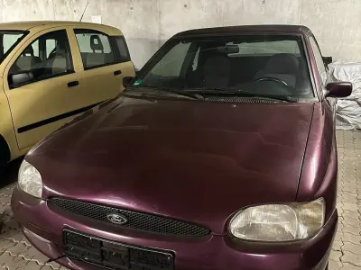 Gebraucht Ford Escort Cabriolet 105 PS (77 kW) 1996 Rot Cabrio