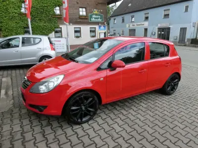 Używany Opel Corsa Basis 60 KM (44 kW) 2009 Czerwony Hatchback