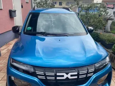 Gebraucht Dacia Spring Essentiel 33 kW (45 PS) 2023 Blau Kleinwagen