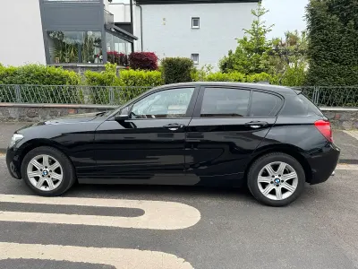 Second-hand BMW 116 120 CP (88 kW) 2013 Negru Hatchback