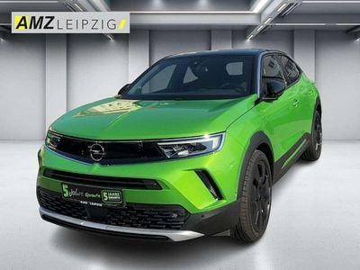 Gebraucht Opel Mokka Ultimate 131 PS (96 kW) 2023 Lackierung matcha green/typ aussenverkle (metallic) SUV