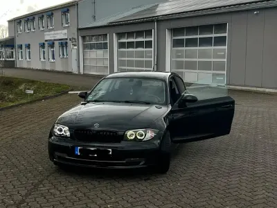 Gebraucht BMW 116 122 PS (89 kW) 2007 Schwarz Kleinwagen