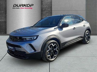 Gebraucht Opel Mokka-e Ultimate 100 kW (136 PS) 2023 Lack grau artense/typ aussenve SUV