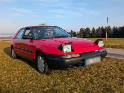 Gebraucht Mazda 323F 88 PS (64 kW) 1990 Rot Kleinwagen