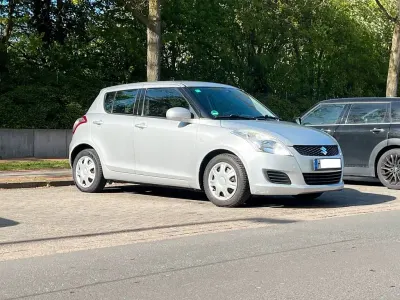 Begagnad Suzuki Swift 94 HK (69 kW) 2013 Grå Halvkombi