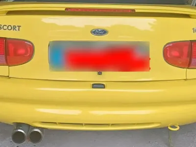 Gebraucht Ford Escort Cabriolet 90 PS (66 kW) 1996 Gelb Cabrio