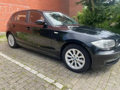 Gebraucht BMW 118 115 PS (84 kW) 2007 Schwarz Kleinwagen