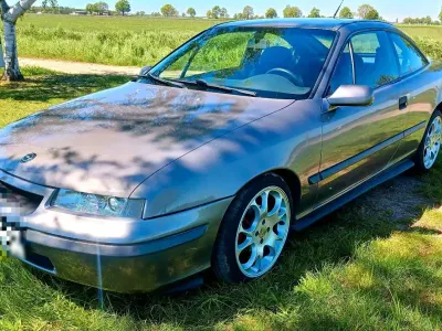Second-hand Opel Calibra 115 CP (84 kW) 1992 Argintiu Coupe