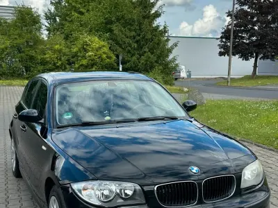 Gebraucht BMW 116 122 PS (89 kW) 2009 Schwarz Kleinwagen