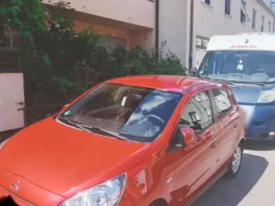 Gebraucht Mitsubishi Space Star 80 PS (58 kW) 2014 Rot Van / Kleinbus