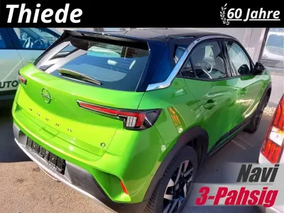Gebraucht Opel Mokka-e Elegance 100 kW (136 PS) 2023 Matcha grün metallic SUV