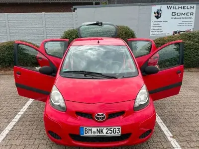 Gebraucht Toyota Aygo 68 PS (50 kW) 2009 Rot Kleinwagen