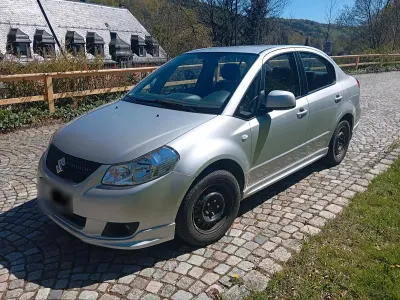 Second-hand Suzuki SX4 120 CP (88 kW) 2012 Argintiu Berlinǎ