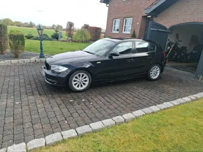 Używany BMW 116 122 KM (89 kW) 2008 Czarny Hatchback