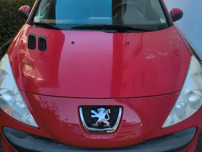 Gebraucht Peugeot 206+ 60 PS (44 kW) 2009 Rot Kleinwagen